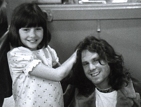 Jim Morrison with a little girl